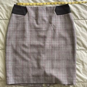 Size 8 pencil skirt from Limited. grey black and white plaid with a line of red